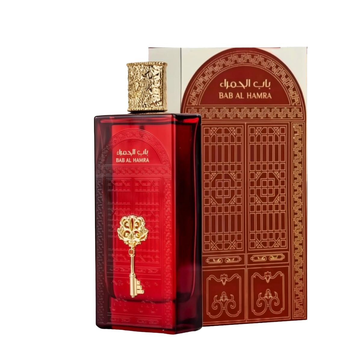 The image features a rectangular perfume bottle with a deep red hue and a highly ornate gold cap. On the bottle is an embossed golden emblem in the shape of a key, which adds to the luxurious appearance of the product. Accompanying the bottle is a box with Arabic and English text, "??? ?????? / BAB AL HAMRA," likely the name of the fragrance. The product appears to be of Middle Eastern origin and suggests a fragrance with a rich and exotic scent.