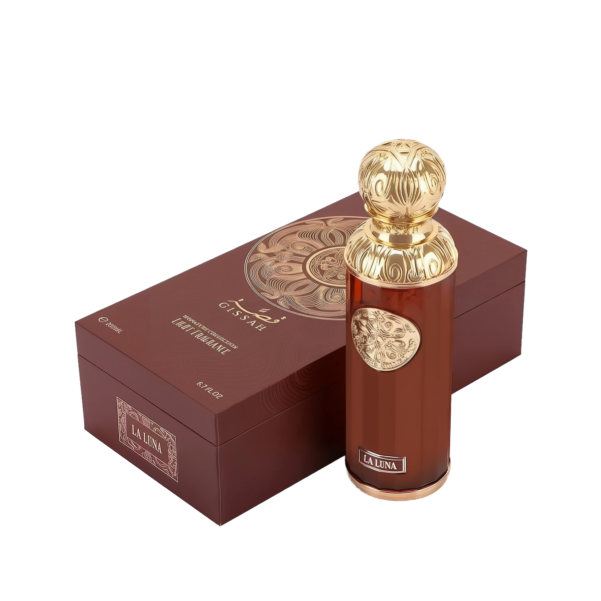The image features "La Luna" by Gissah, displayed alongside its packaging. The perfume bottle is a sleek copper color with a gold ornate medallion and an intricately designed gold spherical cap. The packaging is a deep brown box with a textured surface and a large gold circular mandala design on the top. The box also has the name "Gissah" and "LA LUNA" along with the description "SIGNATURE COLLECTION LIGHT FRAGRANCE."