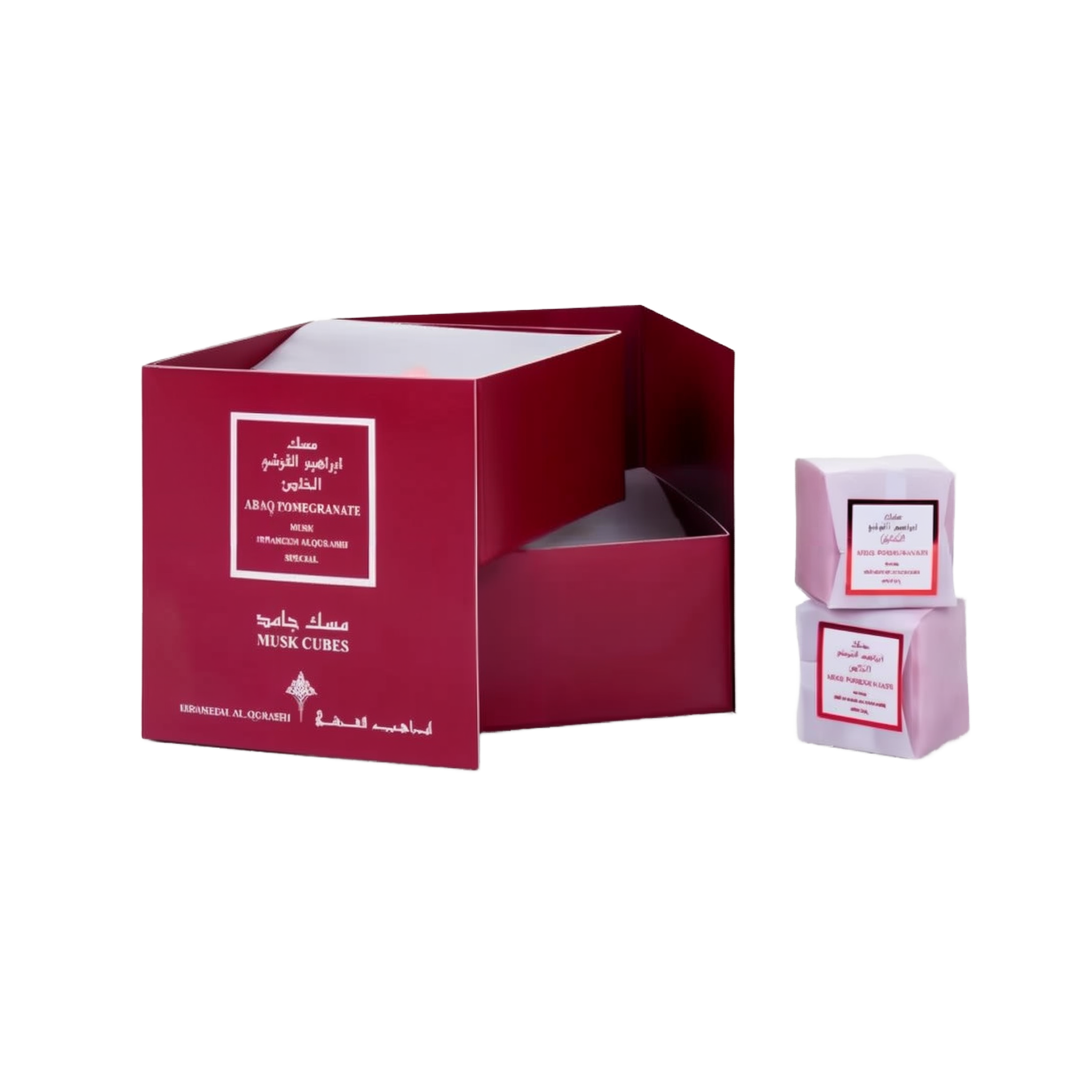 Open maroon Ebraheem Al Qurashi Pomegranate Musk Cubes gift set packaging next to two pink wrapped solid perfume cubes.ebraheem-al-qurashi-pomegranate-musk-cubes-packaging.jpg