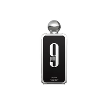 Black bottle of Afnan 9PM Eau De Parfum with bold white text and silver round cap.