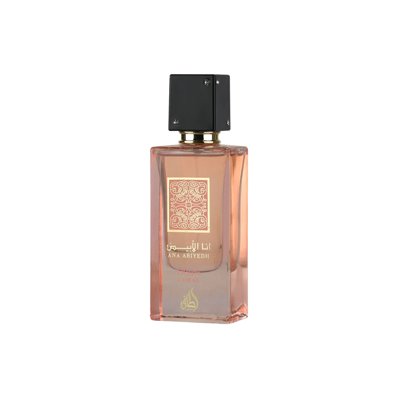 Ana Abiyedh Coral perfume in elegant peach bottle with gold detailing and sleek black cap.