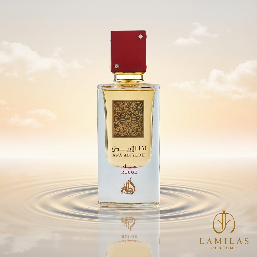Ana Abiyedh Rouge perfume bottle with a golden scent and red cap, centered on rippling water under a soft, golden-toned sky.
