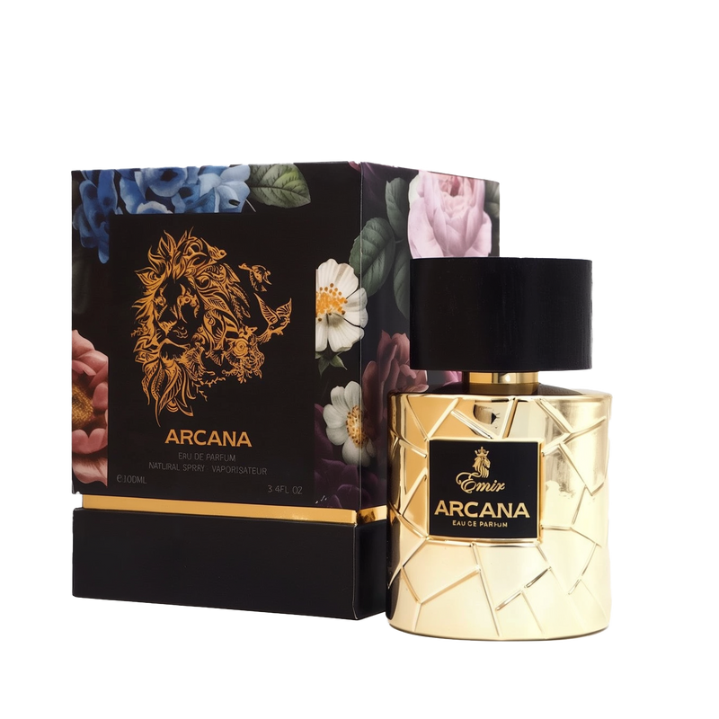 A glamorous, gold-toned perfume bottle of Emir Arcana Eau de Parfum with a black cylindrical cap and a geometric quilted design, shown beside its matching black box adorned with vibrant floral artwork and a striking gold lion motif.