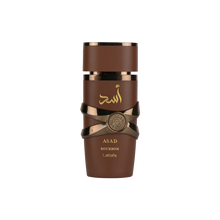 Lattafa Asad Bourbon perfume bottle in brown with gold Arabic script and decorative metallic design.