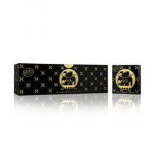 The image shows a sleek, rectangular black box with a glossy finish from the Master Perfumer Collection by Nabeel Perfumes. The box features elegant gold accents in the form of X and plus sign patterns across it. On the front, there's a round gold label with "Bakhoor Irth" inscribed within a circular frame showcasing silhouette imagery of Arabian desert scenes, including palm trees and camels.