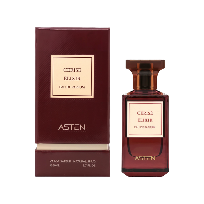 A rectangular, deep burgundy perfume bottle with a matching cap and gold text reading “Cérisé Elixir Eau de Parfum” by ASTEN, shown next to its burgundy box featuring a cream-colored label.