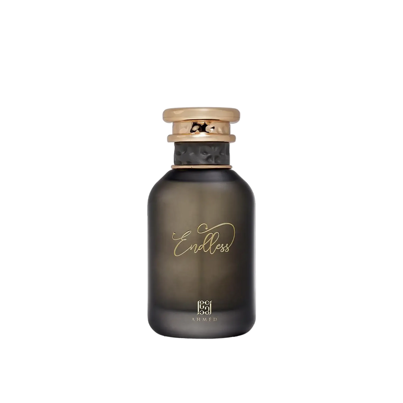 Endless by Ahmed perfume bottle featuring a matte black rounded glass design with gold script, a textured black band, and a gold cap.