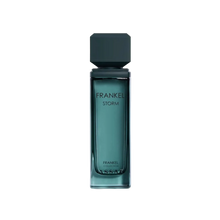 Assaf Frankel Storm perfume bottle in teal glass with a modern square black cap.