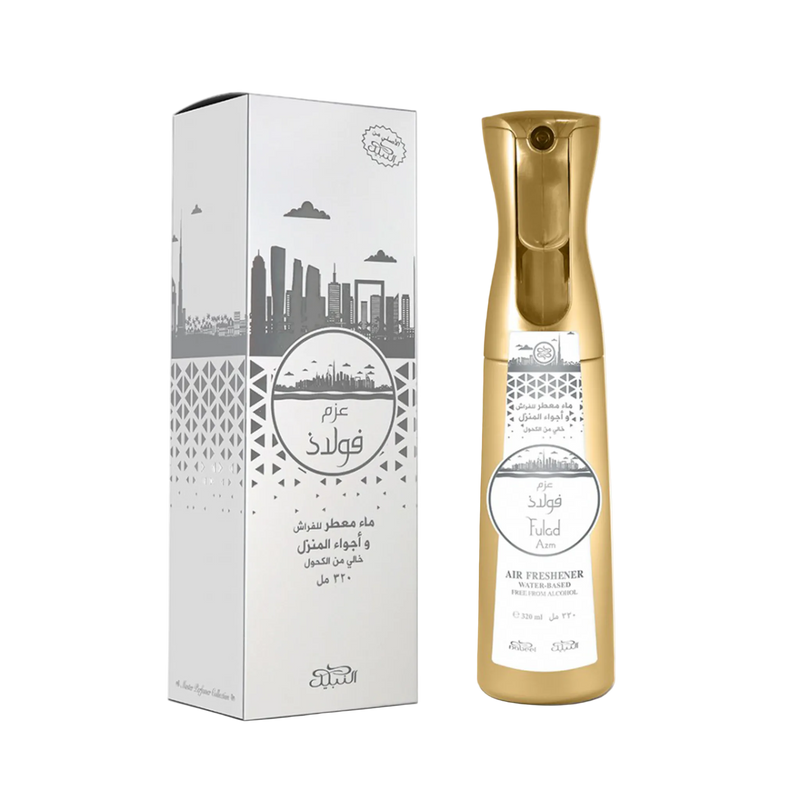 Nabeel Fulad Azm air freshener 320ml with white and silver cityscape packaging and matching gold spray bottle.