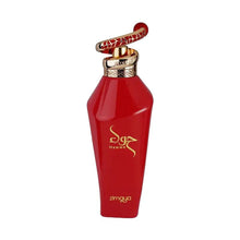The image showcases a glossy red perfume bottle with a gold cap and a decorative gold and red patterned ring on top, resembling a handle. The front of the bottle features the brand's name in gold stylized cursive script, with the word "zimaya" directly below it in a smaller, simple font. The design conveys a sense of elegance and luxury.