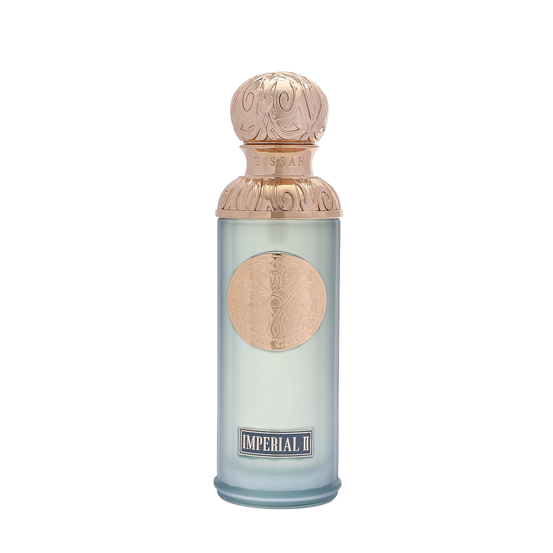 Qissah Imperial II perfume bottle in frosted light blue glass with an ornate gold cap and decorative central emblem.