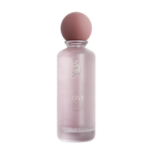Soft pink frosted In Love perfume bottle by Laverne with rounded cap.