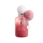 Laverne “It’s All About Me” pink perfume bottle with fluffy pom-pom cap detail.