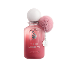 Laverne “It’s All About Me” pink perfume bottle with fluffy pom-pom cap detail.