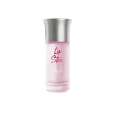 Pink frosted glass perfume bottle with silver cap labeled “Lip Stick”.