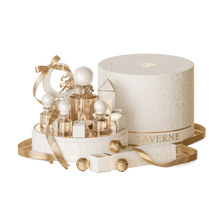 Laverne luxury perfume gift set with multiple mini bottles, decorative packaging, and gold ribbon accents.