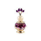 An elegant purple perfume bottle with a gold ornate cap featuring purple gemstones, displayed next to a luxurious purple box with gold floral patterns