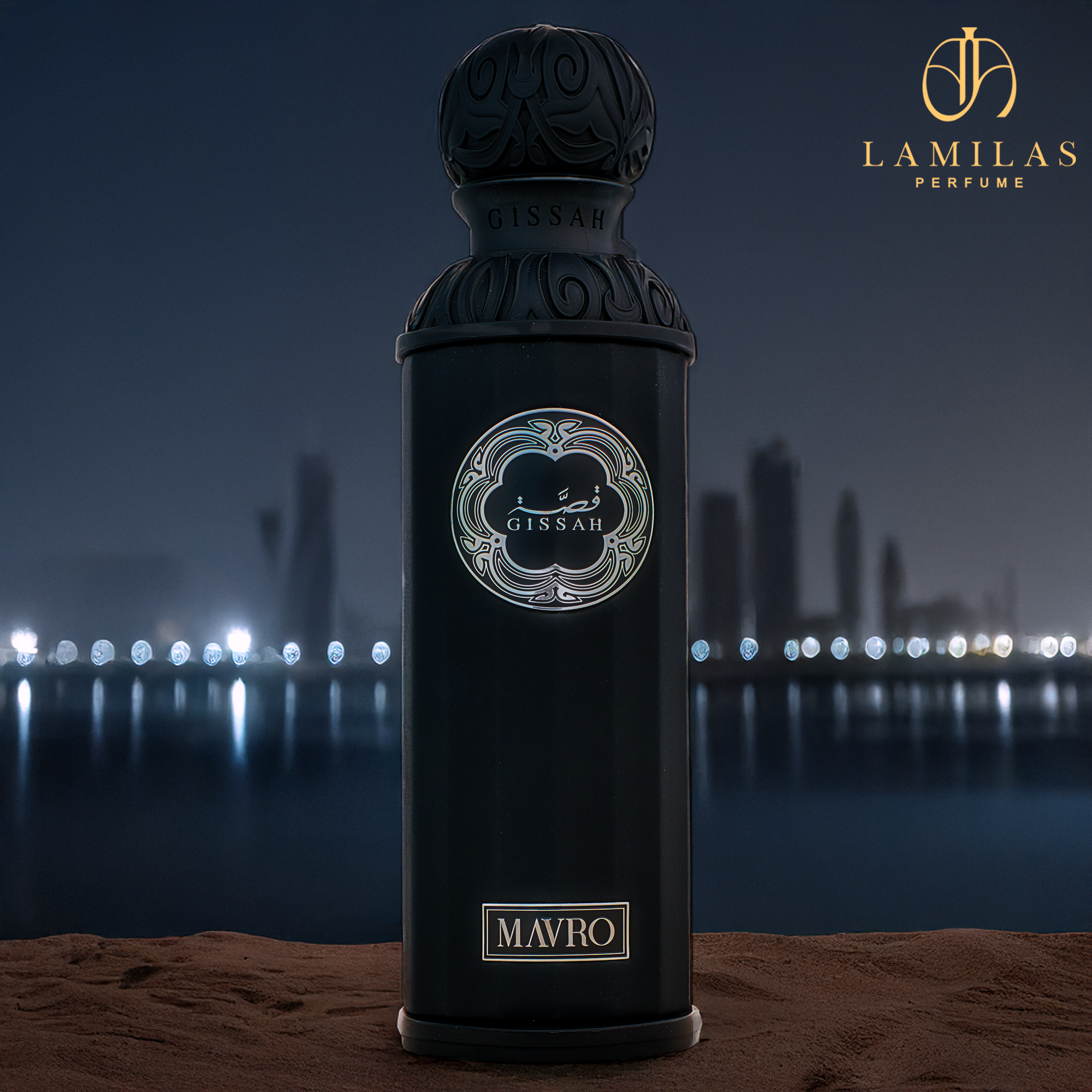 Black Gissah Mavro perfume bottle on sand with city skyline lights at night. 