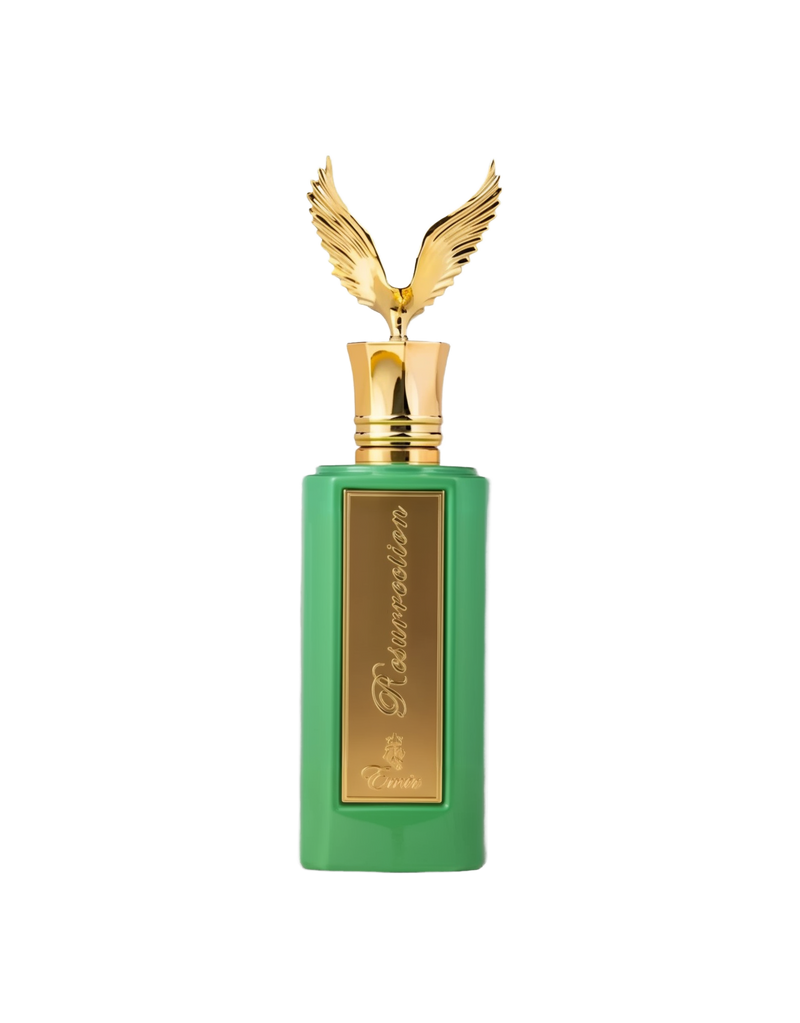 A tall, pastel-green rectangular perfume bottle with a gold plaque reading “Resurrection” in cursive, topped by a decorative gold cap featuring outspread wings.
