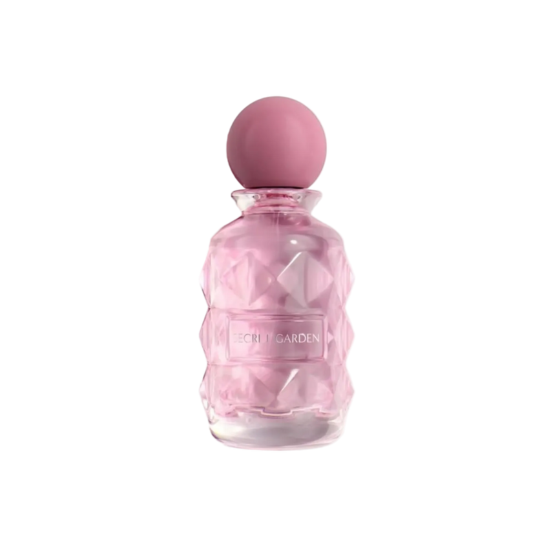 Laverne Secret Garden perfume bottle in soft pink glass with a round cap.
