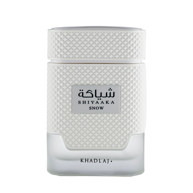 Khadlaj Shiyaaka Snow white perfume bottle with a unique quilted diamond texture and frosted base on black.
