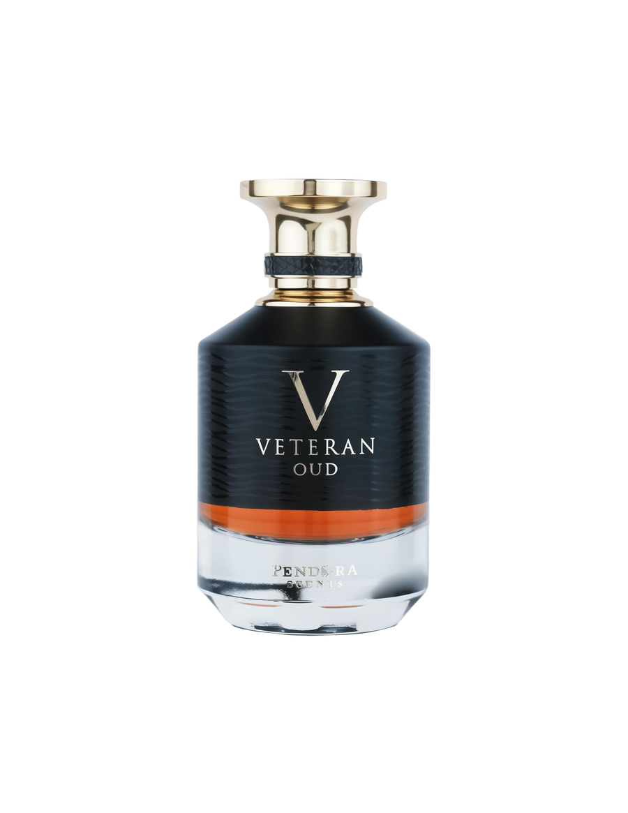 A bottle of "Veteran Oud" by Pendora Scents. The bottle has a sleek and modern design, with a black upper half and a clear glass bottom that reveals an amber-colored fragrance. The bottle features a golden cap with a wide, polished base and a black textur