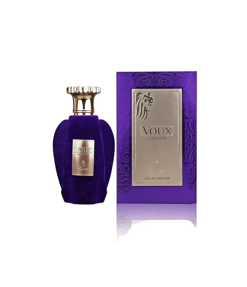 A rectangular purple box with ornate detailing, featuring a gold panel labeled “Voux Violette” by Paris Corner (Eau de Parfum). The matching perfume bottle has a plush purple velvet finish, a gold-toned cap with a decorative edge, and the same “Voux Violette” branding on the front.
